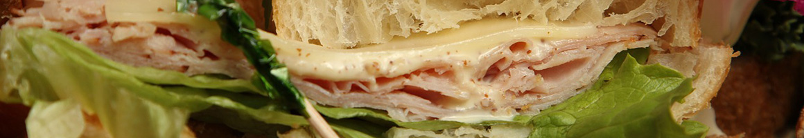 Eating Sandwich Salad at Hoagies Plus restaurant in Philadelphia, PA.